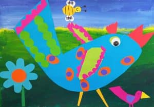 Collage of a bird on a painted background with land & sky, brightly coloured