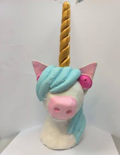 Clay sculpture of unicorn's head