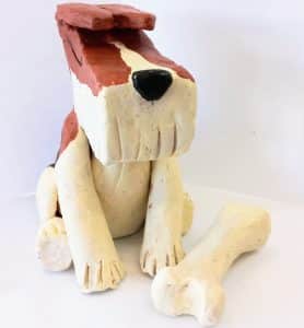 cute dog sculpture in clay, acrylic