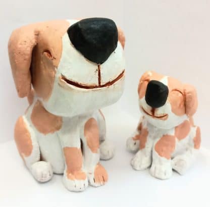 Pups in clay sculpture