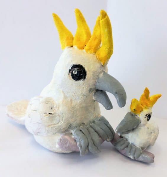 Art just for fun, cute cockatoo & chick in clay sculpture